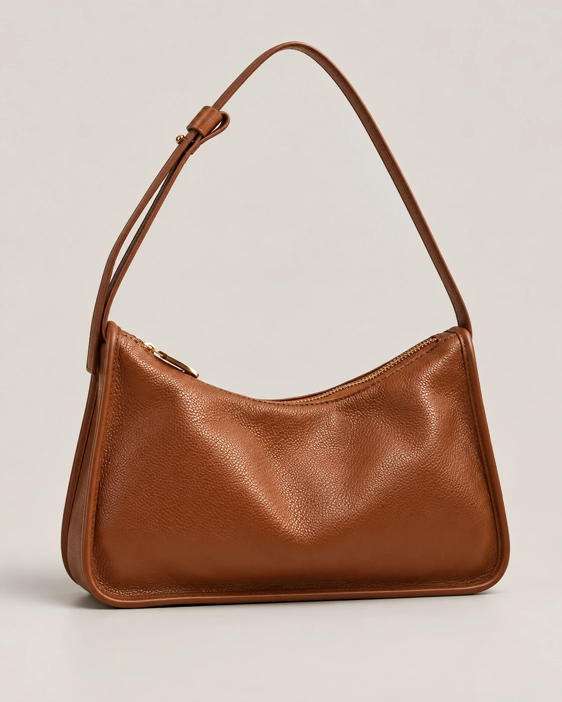 Conceito da bolsa Luna em couro caramelo